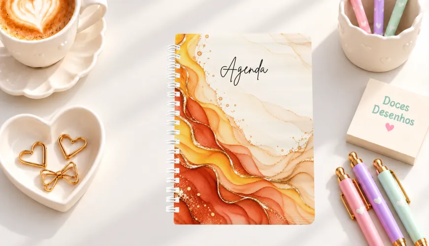 Agenda 2027 com capa em aquarela terracota, laranja e detalhes dourados
