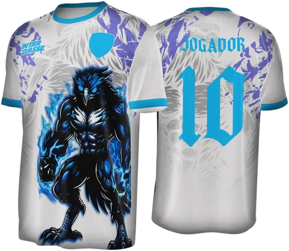 Camisa branca com gola e punhos azuis, frente com águia preta e azul elétrica ao centro, texto 'INTER CLASSE' e escudo azul no peito. Costas apresentam o número 10 azul e o texto 'JOGADOR' acima, com detalhes de penas cinza e manchas roxas.