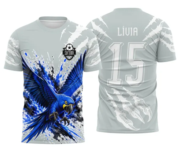 Arte impactante de arara azul para camisa escolar de interclasse com composição dinâmica Arte Autoral Doces Desenhos