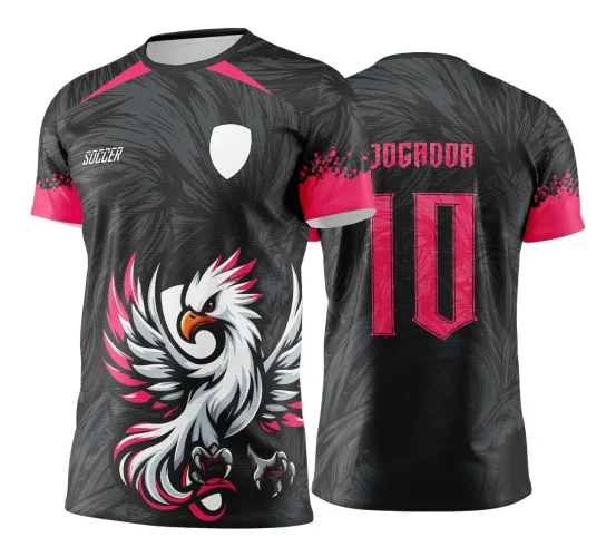 Camisa preta com detalhes em rosa, frente com grande águia branca estilizada em pose de ataque e escudo branco no peito, costas exibem nome JOGADOR e número 10 em rosa; detalhes gráficos em degradê preto e rosa nas mangas.