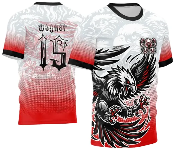 Camisa com fundo degradê branco para vermelho, águia gótica preta e branca com detalhes vermelhos na frente, texto Soccer à direita, costas com número 15 em fonte gótica e nome Wagner acima, gola e punhos pretos.