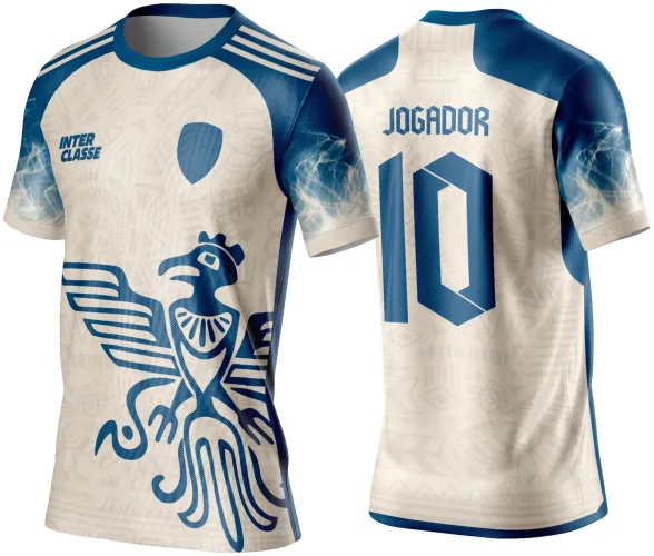 Camisa creme com figura de condor azul estilizado na frente, texto INTER CLASSE e escudo azul, costas com texto JOGADOR, número 10 em azul e detalhes em fumaça nas mangas.