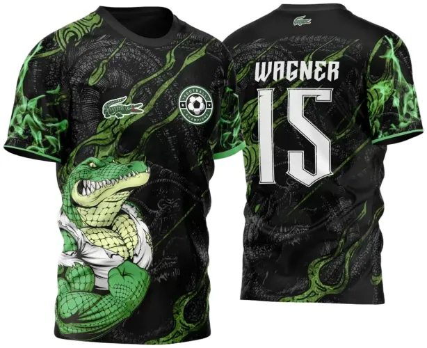 Camisa preta com estampa frontal de um crocodilo verde musculoso em pose confiante, detalhes em chamas verdes, escudo com bola nas costas nome WAGNER e número 15 em branco grande.