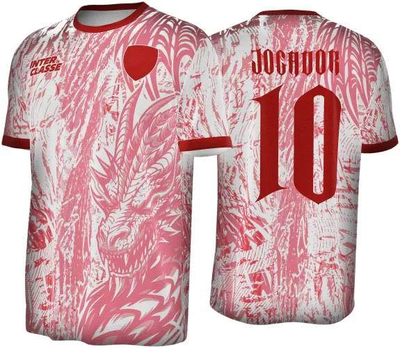 Camisa com dragão de gelo em rosa e branco na frente, gola e punhos vermelhos, escudo vermelho e texto INTER CLASSE no peito, costas com número 10 vermelho e texto JOGADOR ao topo.