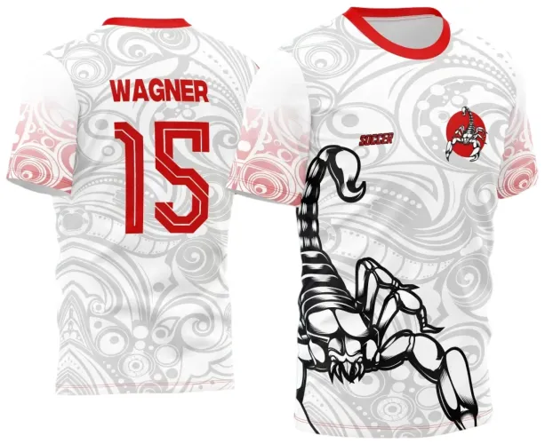 Camisa branca com escorpião preto em destaque na frente, fundo cinza claro com formas abstratas, manga com degradê rosa e gola vermelha; costas com nome WAGNER e número 15 em vermelho sobre padrão cinza claro