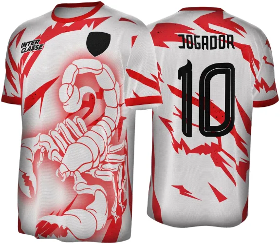 Camisa branca com detalhes vermelhos e estampa principal de escorpião contornado em vermelho na frente, texto 'INTER CLASSE' e escudo preto. Costas mostram número 10 e texto 'JOGADOR' em preto, com riscos vermelhos espalhados.