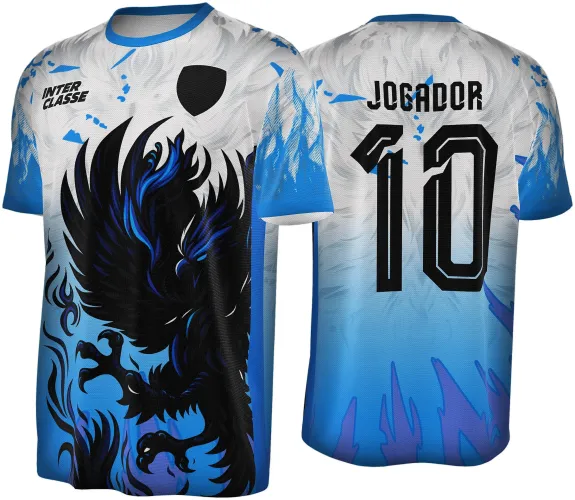Camisa com frente predominante branca e azul, com grande fênix preta e azul em chamas, texto INTER CLASSE e escudo preto na frente; atrás número 10 e texto JOGADOR em preto com fundo degradê em tons de azul.