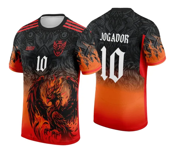 Camisa preta com degradê vermelho e laranja, fênix flamejante na frente, escudo vermelho com coroa, número 10 branco e textos 'SOCCER' e 'JOGADOR' nas costas em branco sobre fundo preto com detalhes artísticos.