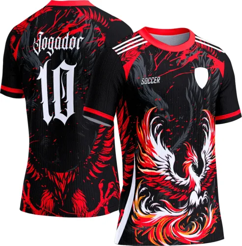 Camisa preta com fênix vermelha, branca e laranja em chamas na frente, texto 'SOCCER' e escudo branco na parte superior. Nas costas, pássaro vermelho, palavras 'Jogador' e número 10 em branco com estilo gótico.