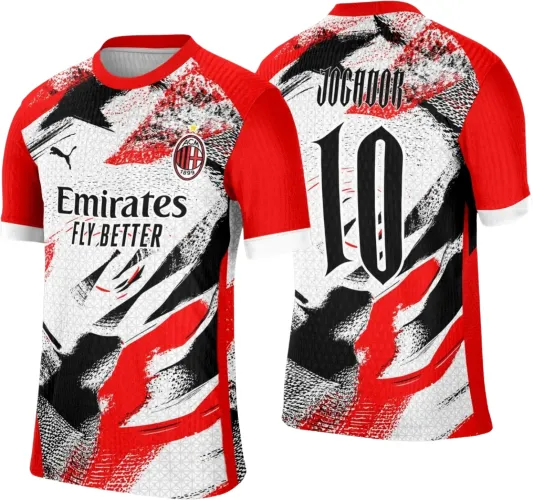 Camisa com arte abstrata em vermelho, branco e preto, com escudo ACM, texto 'Emirates FLY BETTER' na frente, mangas vermelhas e costas com o número 10 e a palavra 'JOGADOR' acima.