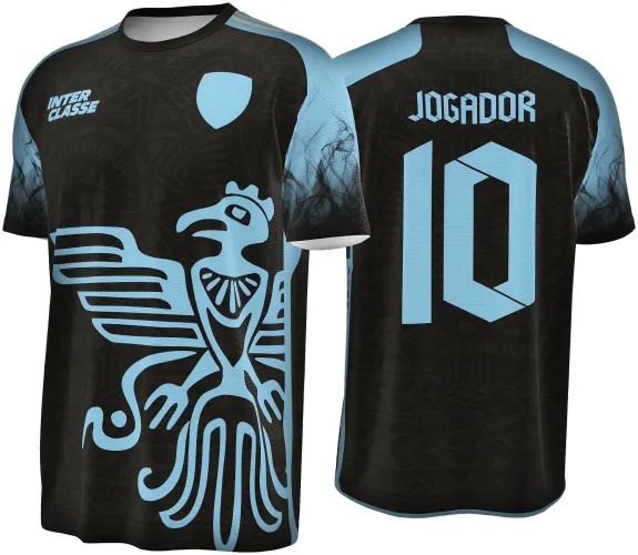 Camisa com frente preta e azul claro, apresenta figura grande de águia estilizada no centro, texto INTER CLASSE no peito e mangas com degradê. Costas com número 10 e palavra JOGADOR em azul claro sobre fundo preto.