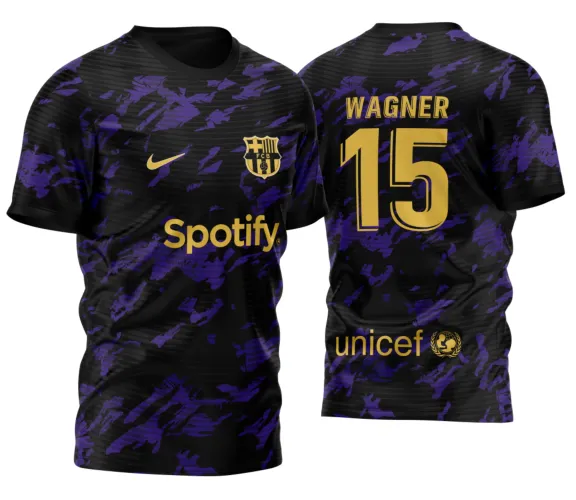 Camisa preta com detalhes roxos em camuflado, escudo FCB dourado e logo Nike na frente, texto Spotify dourado centralizado, costas com nome WAGNER, número 15 grande em dourado e logo UNICEF na parte inferior.