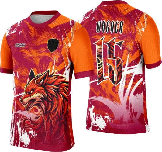 Camisa com frente vermelha e laranja destacando um lobo flamejante, fundo grafitado em branco, texto SOCCER e escudo preto, costas com número 15 grande e nome WACER, mangas laranja com punhos vermelhos.