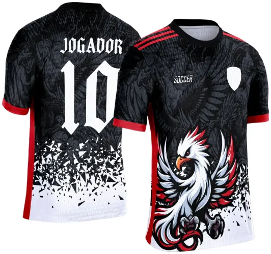 Camisa com frente preta e detalhe de fênix branca com vermelho e laranja no centro, faixa vermelha nas mangas e ombros. Nas costas, nome JOGADOR com número 10 em branco sobre fundo preto com degradê e fragmentos brancos na parte inferior.