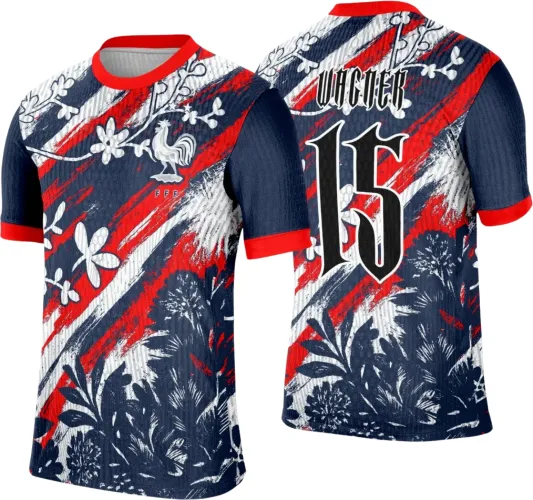Camisa com fundo azul escuro, listras diagonais vermelhas e brancas e detalhes florais brancos. Frente tem galo francês branco com FFF; costas têm número 15 preto e branco e nome VACIER em fonte gótica, mangas azul com bordas vermelhas.