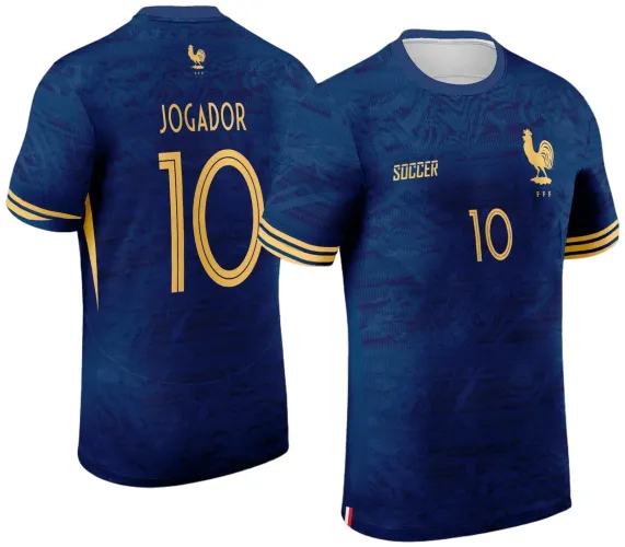 Camisa azul-marinho com detalhes dourados, frente com número 10, texto SOCCER e galo FFF, costas com galo FFF pequeno, texto JOGADOR e número 10 grandes em dourado, mangas com listras douradas