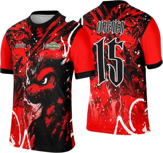 Camisa com arte de lobo vermelho e preto na frente, texto SOCCER e logo DIGIMON. Nas costas, personagem em vermelho com o número 15 em branco e texto WICKER. Mangas vermelhas com detalhes pretos.