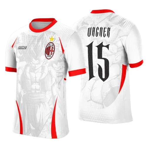 Camisa branca com detalhes vermelhos, com figura de Goku em tom cinza na frente e atrás, escudo Milan na frente, nome Wagner e número 15 em preto nas costas.
