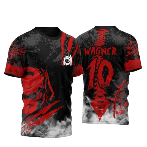 Camisa preta com arte do Predador em vermelho na frente com garras e textura pontilhada, logo do rosto branco; costas com coluna vertebral vermelha, nome Wagner, número 10 e efeitos de fumaça cinza e vermelho