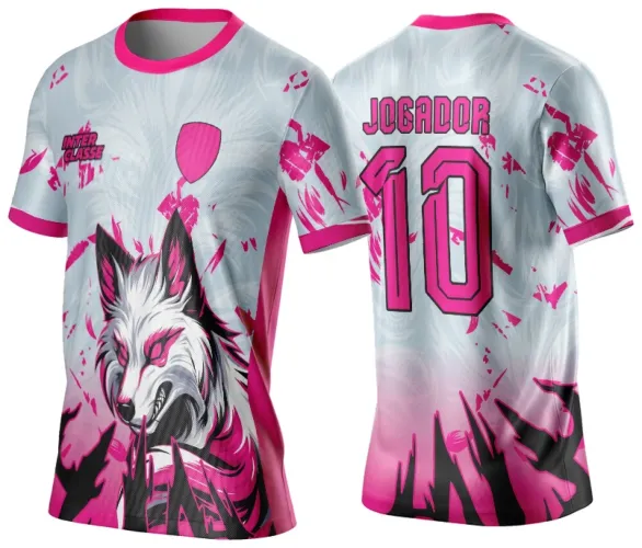 Camisa com tecido branco e rosa, na frente raposa branca com traços pink, texto INTER CLASSE, atrás grande número 10 e JOGADOR em rosa, fundo com degradê e grafismos rosa.