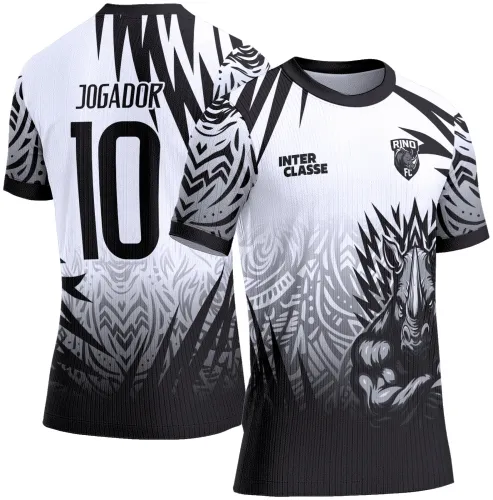 Camisa branca e preta com figura tribal de rinoceronte em tons de cinza na frente, textos INTER CLASSE e escudo RINO FC, número 10 e palavra JOGADOR nas costas com fundo em degradê e detalhes tribais nas mangas