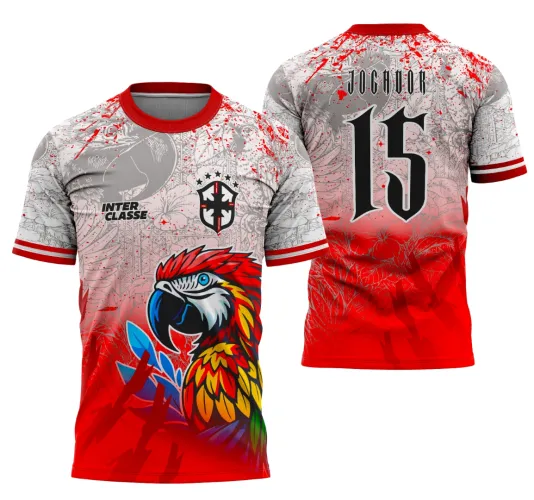 Foto da camisa exibindo logo no peito e estampa grande nas costas com desenho vibrante de uma arara colorida representando o tema escolar interclasse número 13, perfeita para eventos escolares.
