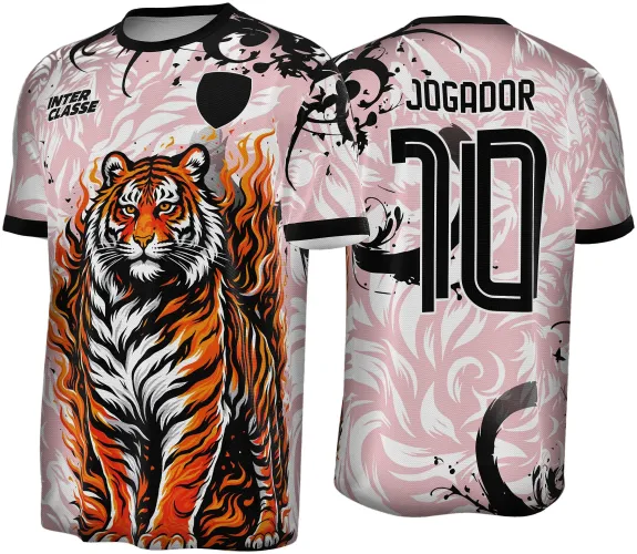 Camisa rosa com estampa de tigre em chamas laranja e preto na frente, texto INTER CLASSE e escudo preto, costas com texto JOGADOR e número 10 preto sobre fundo rosa com detalhes em branco e preto