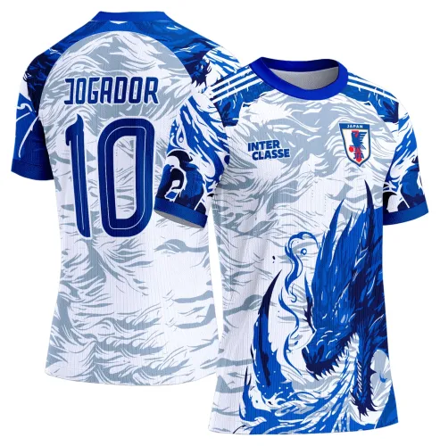 Camisa branca com dragão azul estilizado na frente, escudo JFA e texto INTER CLASSE no peito, costas com nome JOGADOR e número 10 em azul, detalhes em azul e cinza claro.