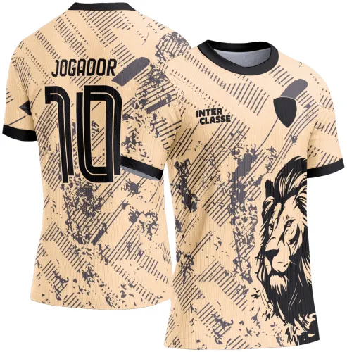 Camisa bege com gola e punhos pretos, frente com desenho grande de leão estilizado em preto no lado direito e texto INTER CLASSE; costas exibem o texto JOGADOR e número 10 em preto sobre padrão de linhas e manchas cinza escuro.