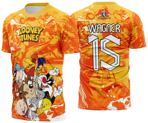 Camisa com fundo laranja e amarelo degradê, vários personagens Looney Tunes na frente com logo escrito LOONEY TUNES, nas costas nome WAGNER e número 15 em branco, com sombras dos personagens ao fundo e logo Looney Tunes no topo.