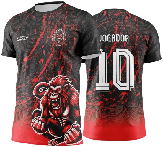 Camisa preta com degradê vermelho, frente com grande figura de macaco furioso em pose agressiva e escudo pequeno do macaco, costas com o texto JOGADOR e número 10 em branco sobre fundo com manchas vermelhas.