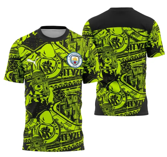 Camisa com fundo verde-neon e preto, mascote urso em pose de comemoração na frente com escudo Manchester City, 'INTER CLASSE' e 'JOGADOR' escritos; costas com parte preta, fundo verde com elementos arquitetônicos e escudo grande ao centro.