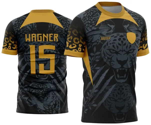 Camisa com estampa frontal de onça preta cinza com detalhes dourados, escudo e texto 'SOCCER' em dourado; costas com nome WAGNER e número 15 dourados, mangas com padrão de onça e gola em dourado