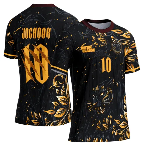Camisa preta com estampa frontal de pantera negra entre folhas douradas, texto INTER CLASSE e número 10 em dourado; costas exibem JOGADOR e número 10 grandes em dourado com detalhes de arranhões, gola vinho e detalhes dourados nas mangas.