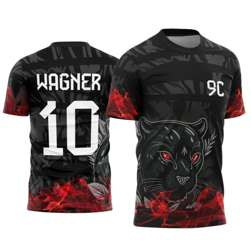 Camisa preta com estampa frontal de pantera negra de olhos vermelhos, fumaça vermelha nas mangas e parte inferior; nas costas nome WAGNER e número 10 em branco sobre fundo preto com padrão geométrico cinza e fumaça vermelha.