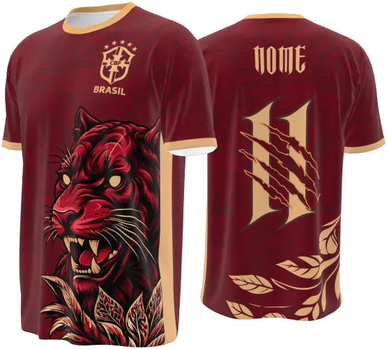 Camisa vinho com estampa frontal de pantera vermelha com folhagens bege e escudo CBF BRASIL, costas com número 11 em bege com marcas de garras vermelhas e texto NOME acima, gola e punhos bege