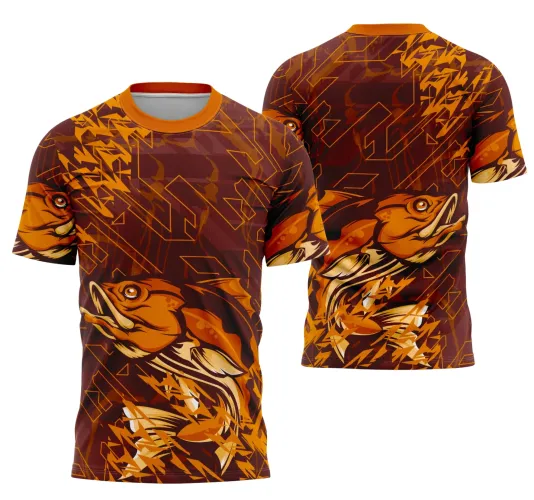 Camisa com design de peixe laranja em movimentação frente e costas, fundo marrom escuro com formas geométricas e textos 'INTER CLASSE', 'JOGADOR' e número 1 nas costas, gola laranja vibrante.