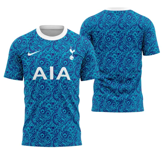 Camisa azul com estampa toda em padrão circular e geométrico em vários tons de azul, gola branca. Frente tem logo Nike branco, escudo de galo com bola e texto 'AIA' em branco. Costas seguem o padrão azul sem textos ou logos.