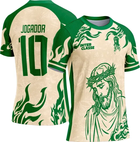 Camisa com figura de Cristo em verde na frente sobre fundo bege, texto INTER CLASSE no peito; costas com número 10 e JOGADOR em verde, detalhes gráficos verdes nas mangas e laterais.