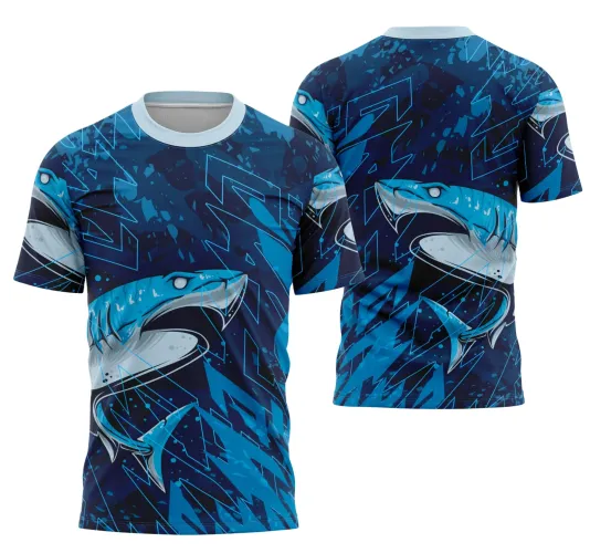 Camisa com fundo azul escuro exibe na frente tubarão azul estilizado e textos INTER CLASSE e 15; costas trazem o tubarão na mesma pose com nome JOGADOR e número 15 em azul claro e degradês geométricos.