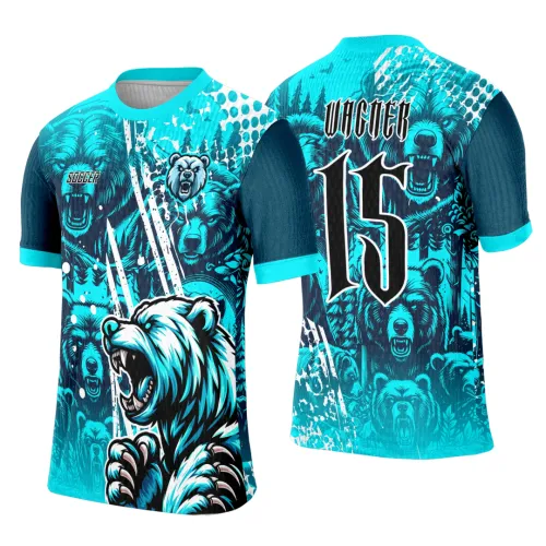 Camisa com estampa frontal de urso feroz rugindo em azul turquesa e branco, fundo com ursos menores e árvores; costas têm o número 15 grande com texto VINCER acima, em azul, branco e preto.