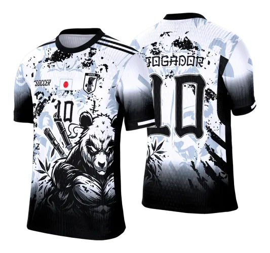 Camisa preta e branca com degrade. Na frente urso panda musculoso em pose agressiva, número 10 e logo Japão com bandeira. Nas costas número 10 grande com texto JOGADOR e INTER CLASSE em destaque.