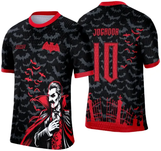 Camisa preta com morcegos cinzas ao fundo, gola e punhos vermelhos. Frente com Dracula em vermelho e branco na parte inferior, além de morcegos vermelhos. Costas exibem número 10 e texto JOGADOR vermelhos acima, com portão de cemitério vermelho no rodapé.
