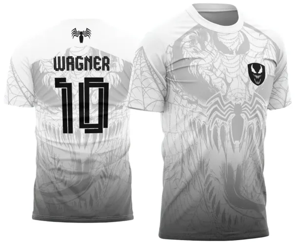 Camisa branca com degrade cinza, aranha estilizada na frente e símbolo de Venom no escudo preto. Nas costas, nome Wagner e número 10 em preto, com ícone de aranha acima e detalhes de teia nas mangas.