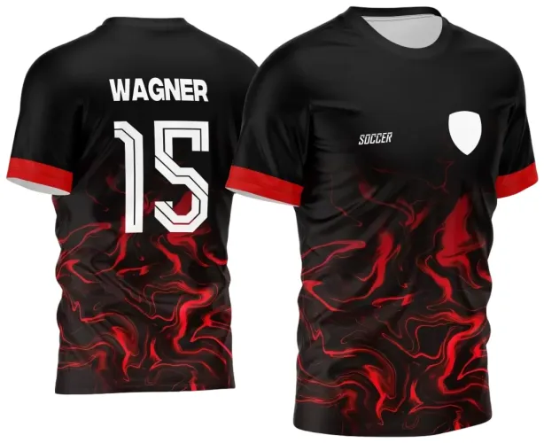Camisa preta com chamas vermelhas estilizadas na frente e costas, mangas com faixa vermelha, frente com texto 'SOCCER' e escudo branco, costas com nome WAGNER e número 15 em branco.