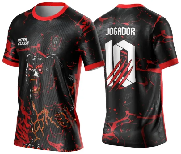 Camisa preta com detalhes em vermelho, apresenta na frente um urso feroz com olhos vermelhos e lava ao redor, texto INTER CLASSE; costas com número 10 branco rasgado por garras vermelhas e a palavra JOGADOR acima.