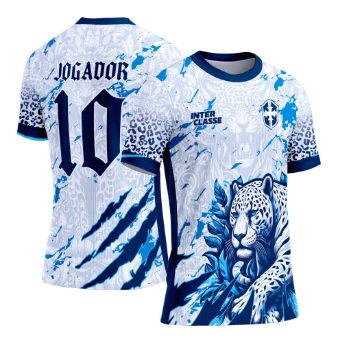 Camisa branca com arte de onça azul estilizada na frente, detalhes em folhas e manchas azuis, escudo no peito e texto INTER CLASSE. Nas costas, número 10 em azul e texto JOGADOR acima, mangas com estampa de onça em azul.