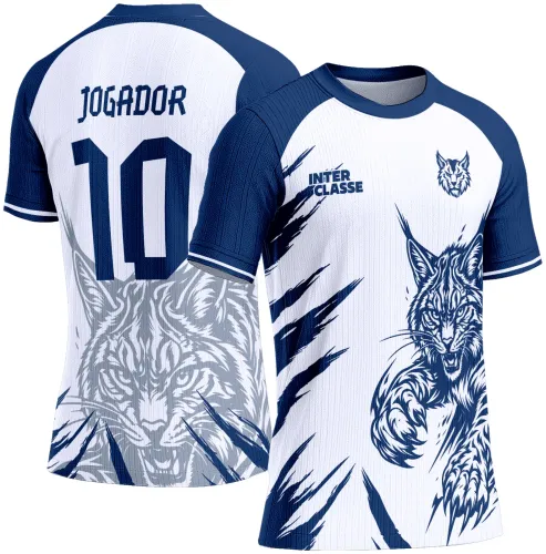 Camisa branca com mangas azuis, frente com grande lince azul em pose de ataque e texto INTER CLASSE, costas com rosto cinza de lince e número 10 abaixo da palavra JOGADOR em azul.