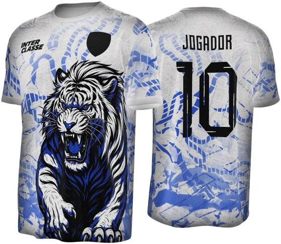 Camisa branca com ilustração frontal de tigre branco e azul rugindo, texto INTER CLASSE e escudo preto. Nas costas, número 10 e palavra JOGADOR em preto sobre padrão azul abstrato.