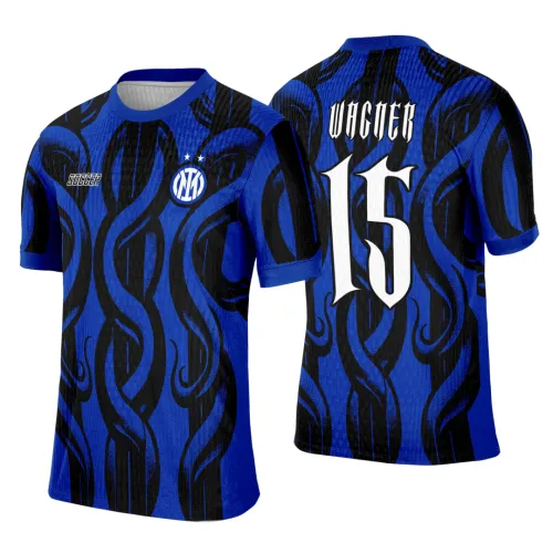 Camisa tribal azul e preta com padrão entrelaçado, escudo 'INTC' branco e azul e texto 'SOCCER' na frente, nome 'VACNER' e grande número 15 em branco nas costas